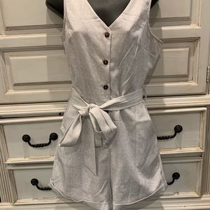 Beige romper with belt